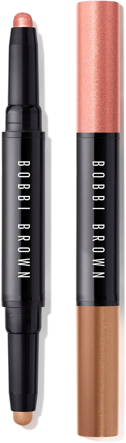 Två makeup-stickor: en rosa highlighter och en beige concealer, med svarta etiketter och vit text.