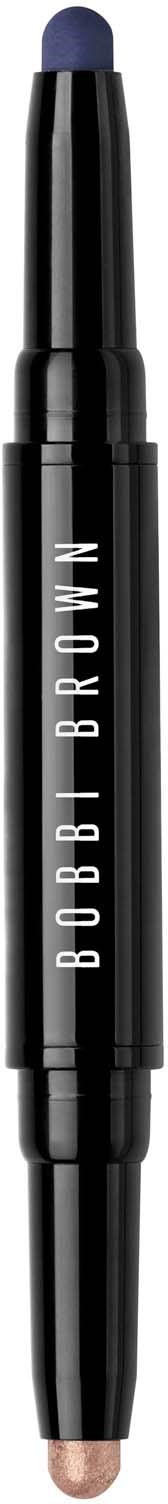 A black makeup stick with white text, labeled Bobbi Brown, with a rounded, blue tip for blending.