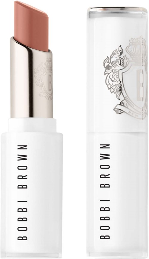 A lip balm or lipstick in a white tube with the brand name Bobbi Brown. The cap is transparent with a logo.