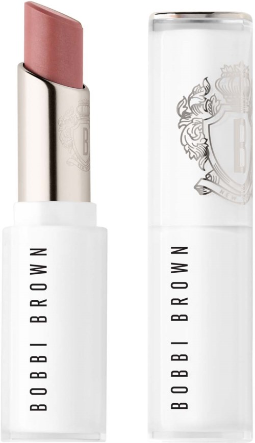 A tube of Bobbi Brown lipstick with light pink color and a clear cap showing the logo and design.