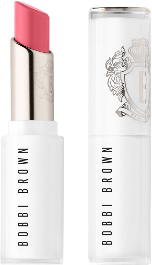 A pink lipstick in a white case with a transparent cap. The brand name Bobbi Brown is written on the case.