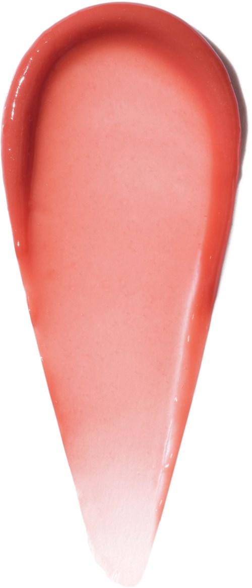 A pinkish eyeshadow applied on a person’s eyelids for makeup.