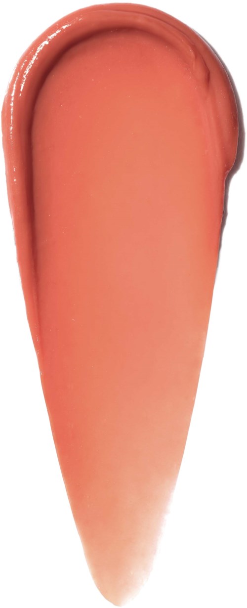 A peach-colored, smooth, elongated smear of gel or cream on a white background.