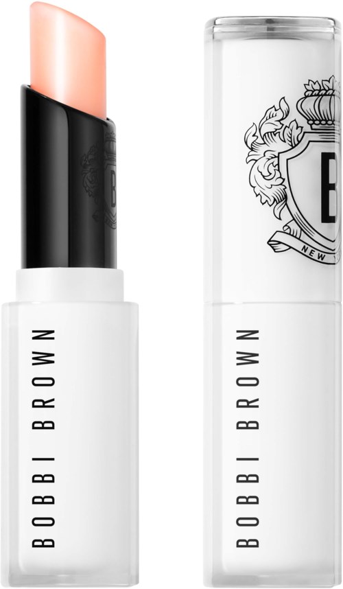 A Bobbi Brown lipstick with a light pink color and a sleek black-and-white case.
