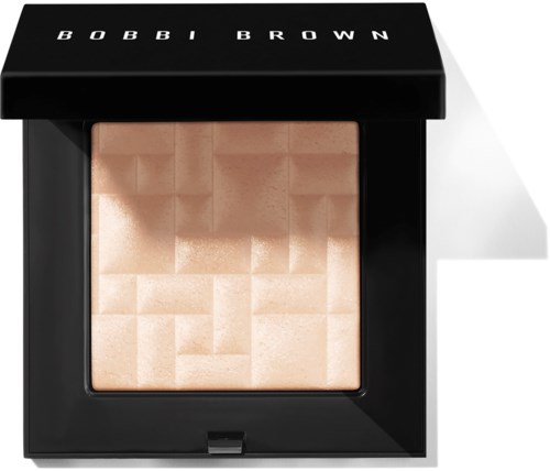 A square, beige powder in a black compact with "BOBBI BROWN" on the lid.