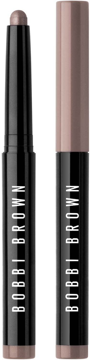 Two BOBBI BROWN makeup sticks, one with beige product exposed, the other with cap on.