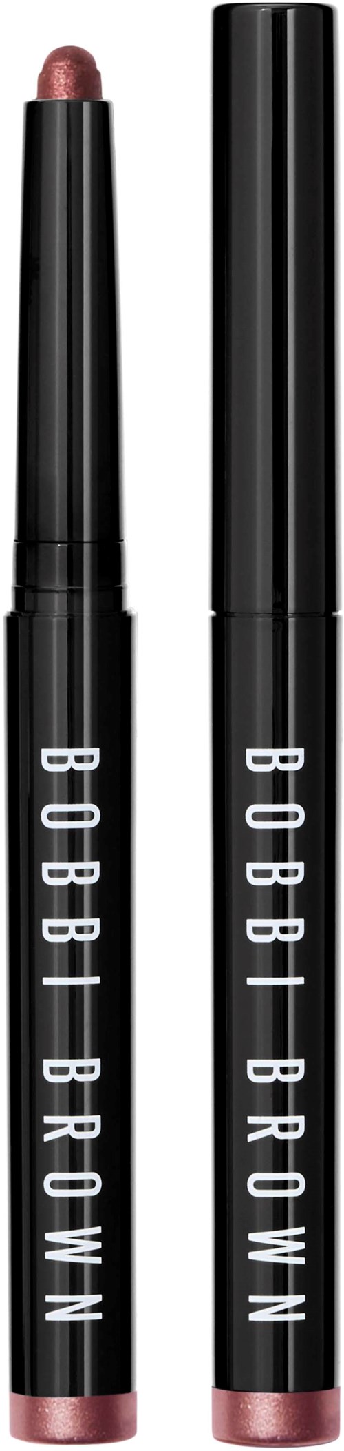 Two lip crayons, one with a pinkish color, inside black packaging with white text reading 'BOBBI BROWN.'