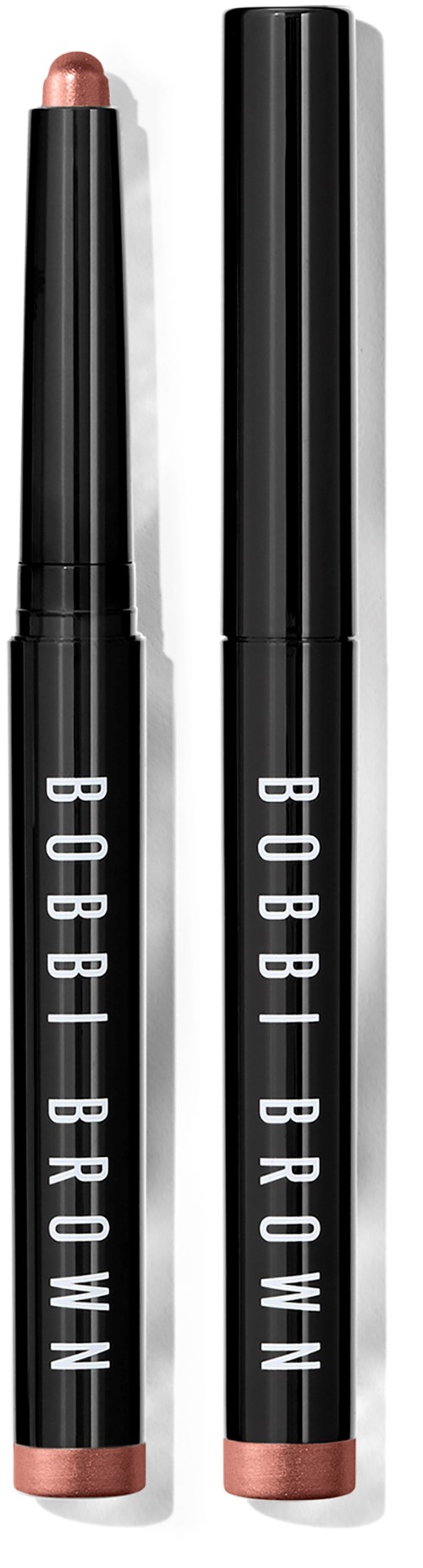 Two lip gloss sticks in black tubes with white text, one open showing a pinkish gloss, the other closed.
