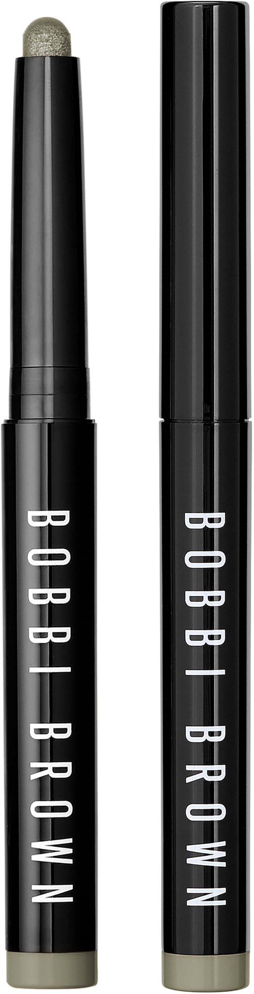 Czarna szminka do makijażu z napisem 'BOBBI BROWN' i otwartym końcem ukazującym beżowy gąbkowy aplikator.