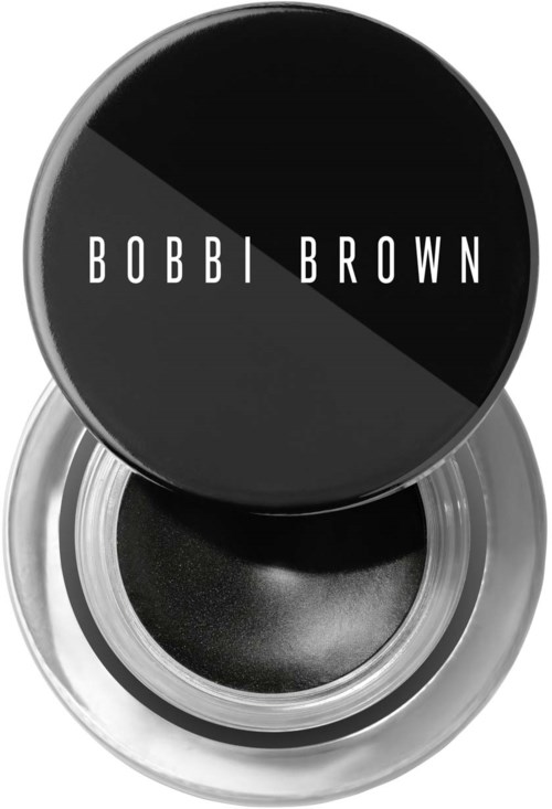 En svart øyeskygge i en rund beholder med lokk med Bobbi Brown-logo i hvite bokstaver.