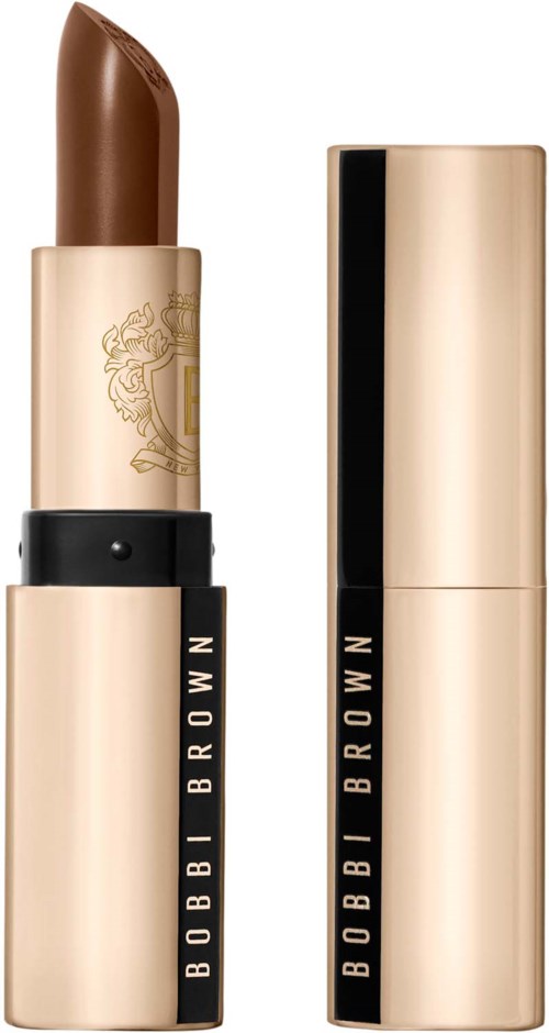 Bobbi Brown leppestift i brun nyanse med gullfarge og svart etui, uten lokk for å vise leppestiften.