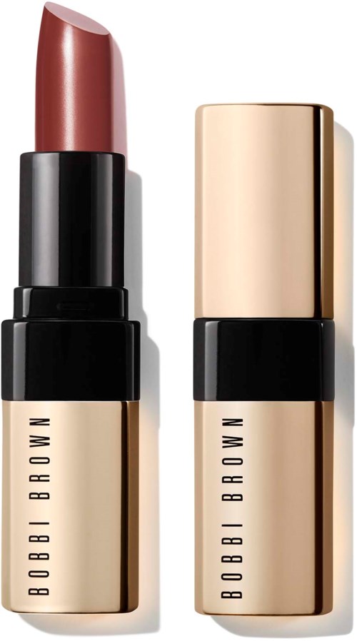 A lipstick in an open case, with a pinkish shade and a closed matching capsule. Both are labeled 'BOBBI BROWN'.