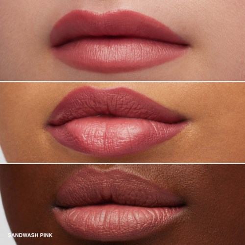 Close-up of three different lip shades on various skin tones, labeled 'Sandwash Pink' at the bottom.