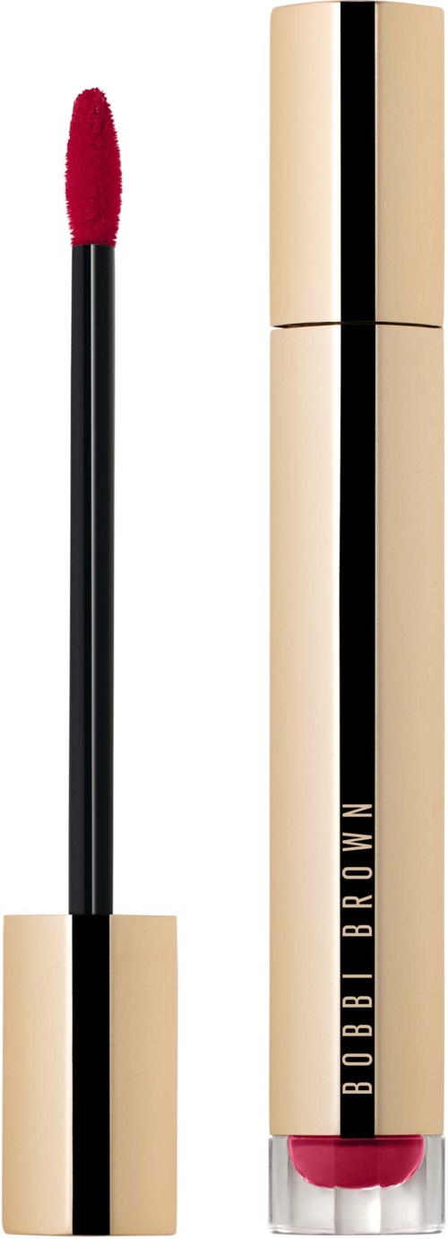 A gold and black tube lipstick with a red applicator showing, labeled 'Bobbi Brown'.