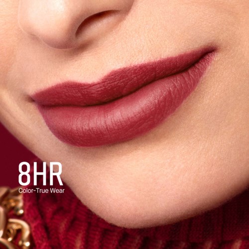 Close-up of lips with dark red lipstick, part of a smiling face, and a red garment.