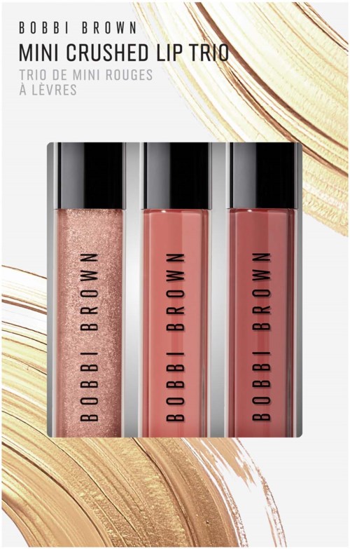 Tre Bobbi Brown läppglans i olika nyanser på vit bakgrund med guldaccenter.