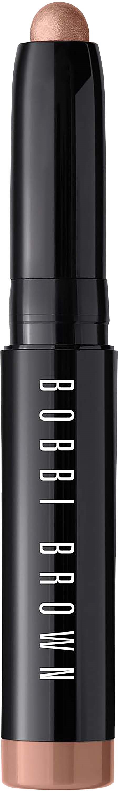 A Bobbi Brown makeup stick with a beige shade at the top and bottom, and the brand name on the black body.