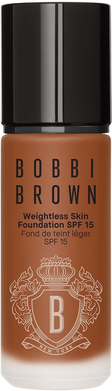 A bottle of Bobbi Brown foundation with SPF 15, in a brown container with black top and logo.