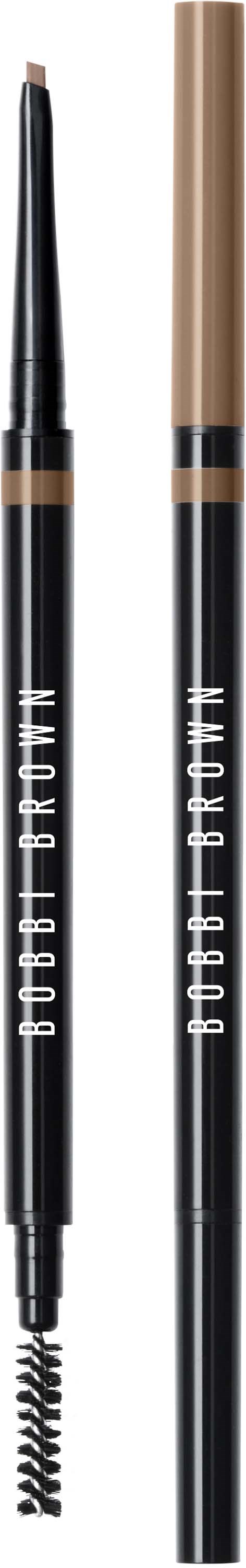 Two eyebrow pencils, one with a spoolie brush and one without, standing upright against a black background.
