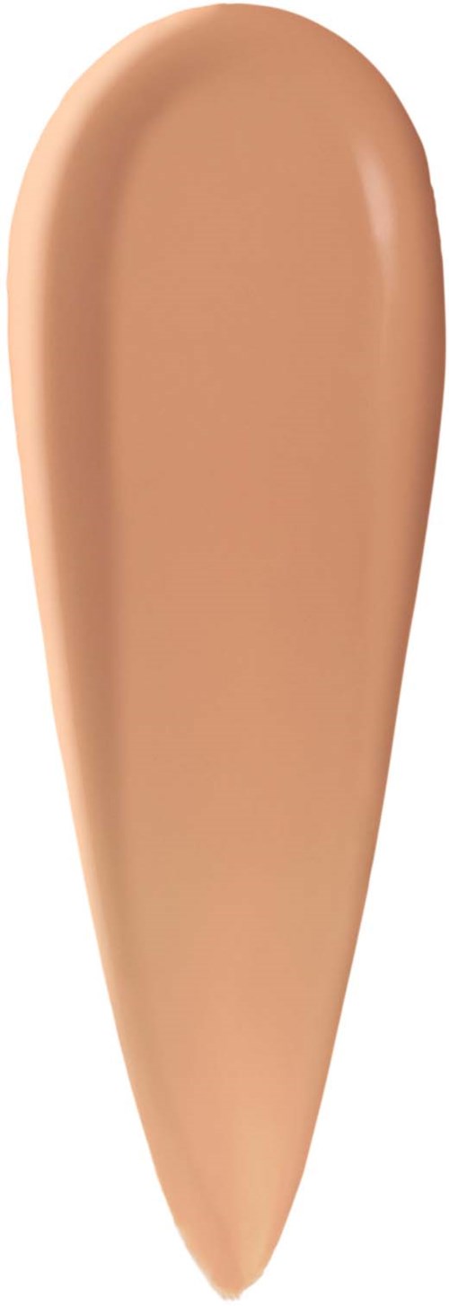 En beige flytande foundationprov på vit bakgrund.