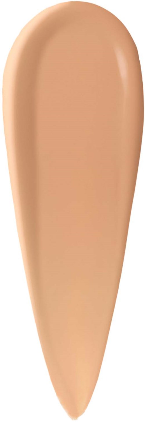 En färgprov av beige foundation på vit bakgrund.