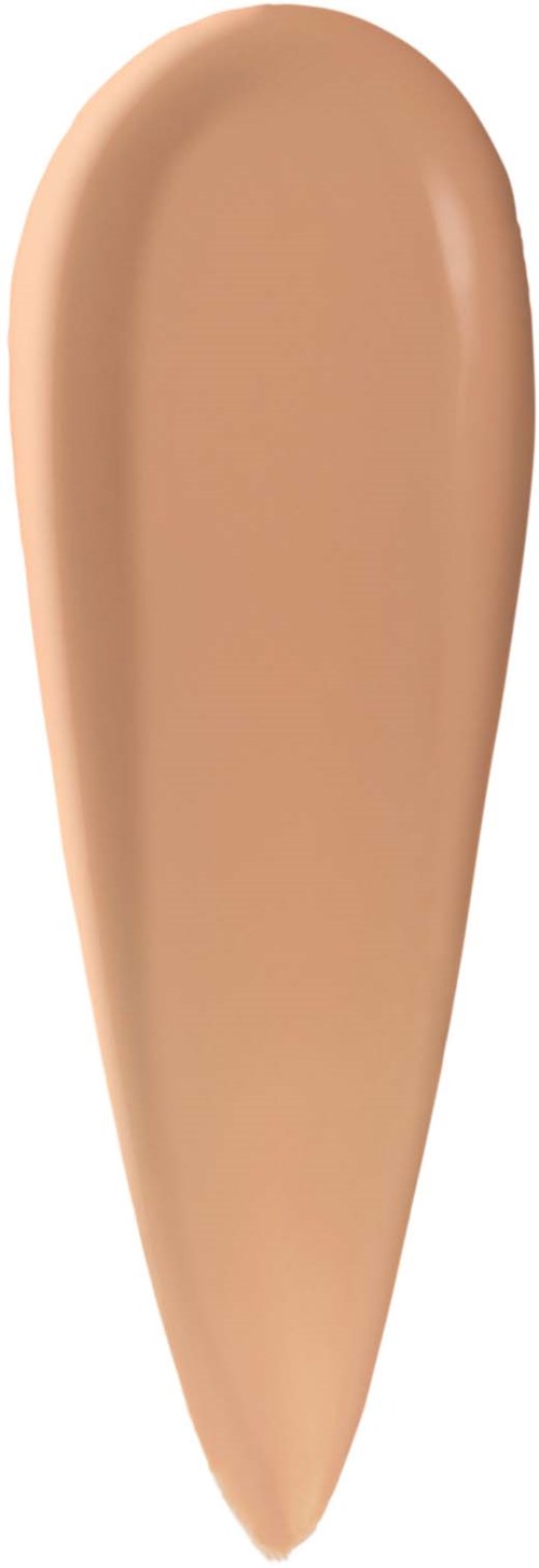 Krämig beige foundationprov på huden som visar en mjuk textur.