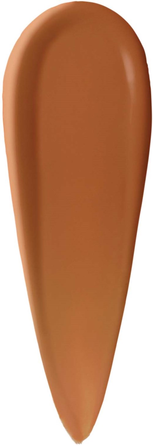 Swatch av medelbrun flytande foundation med slät, krämig konsistens.