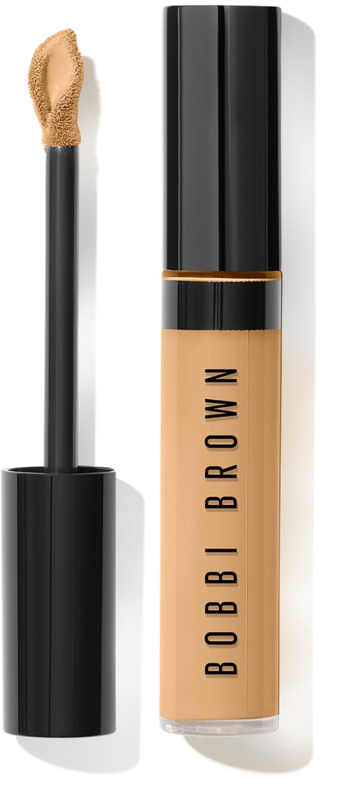 Bobbi Brown peitevoide, jossa musta kansi ja beigemäinen neste sisällä. Sivellin on poistettu, näyttäen tuotteen.