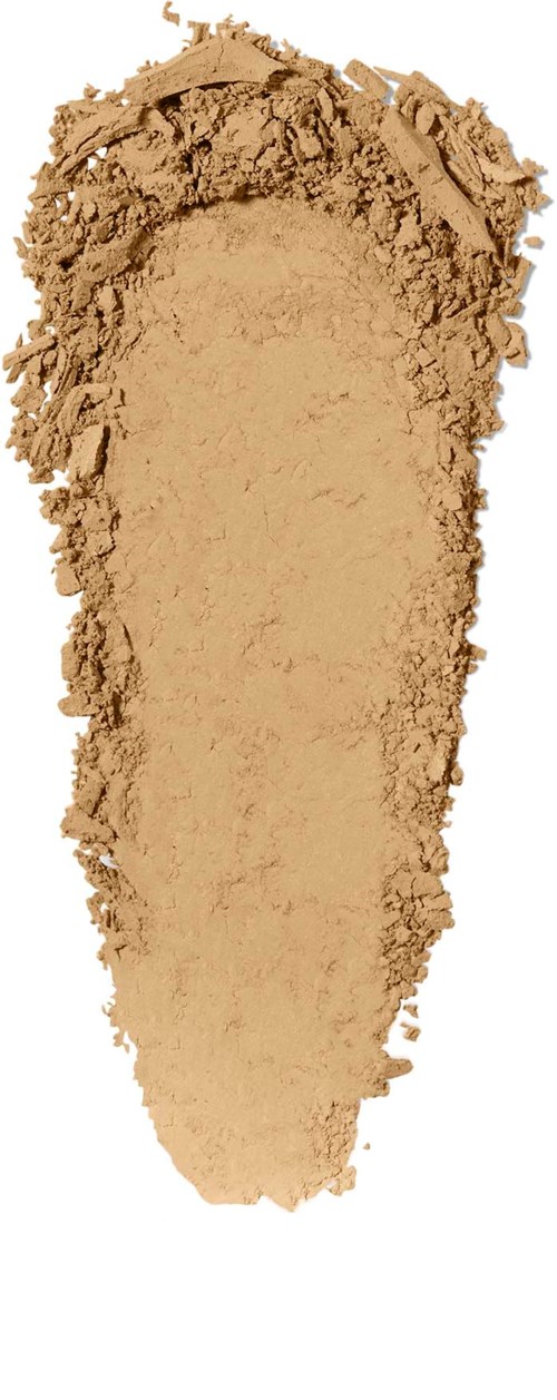 A beige powder spread out in a cone shape, with rough edges and a flat surface.