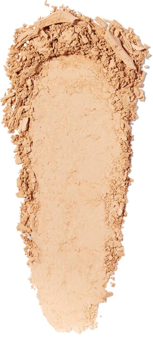 Powdered makeup foundation spread out in a cone shape on a white background.