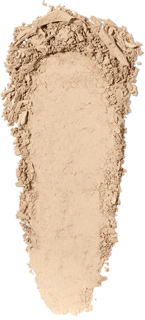 A beige powder spread unevenly, shaped like a tall, narrow cone or footprint.