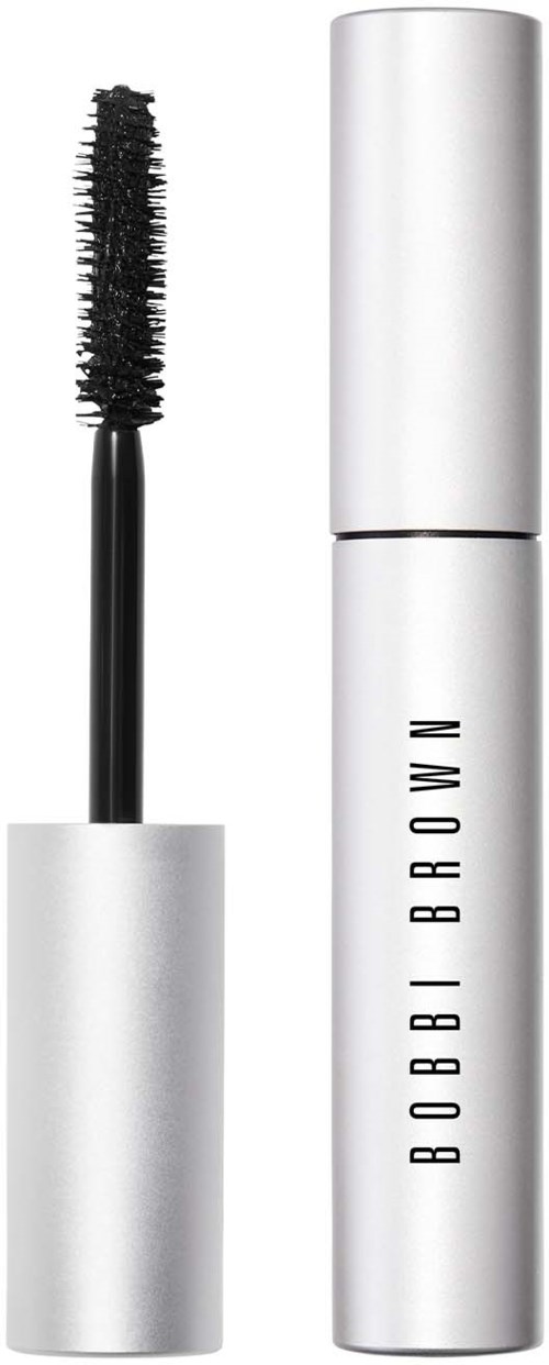 A white tube of eyebrow gel with the wand and brush visible outside. The words "BOBBI BROWN" are on the tube.