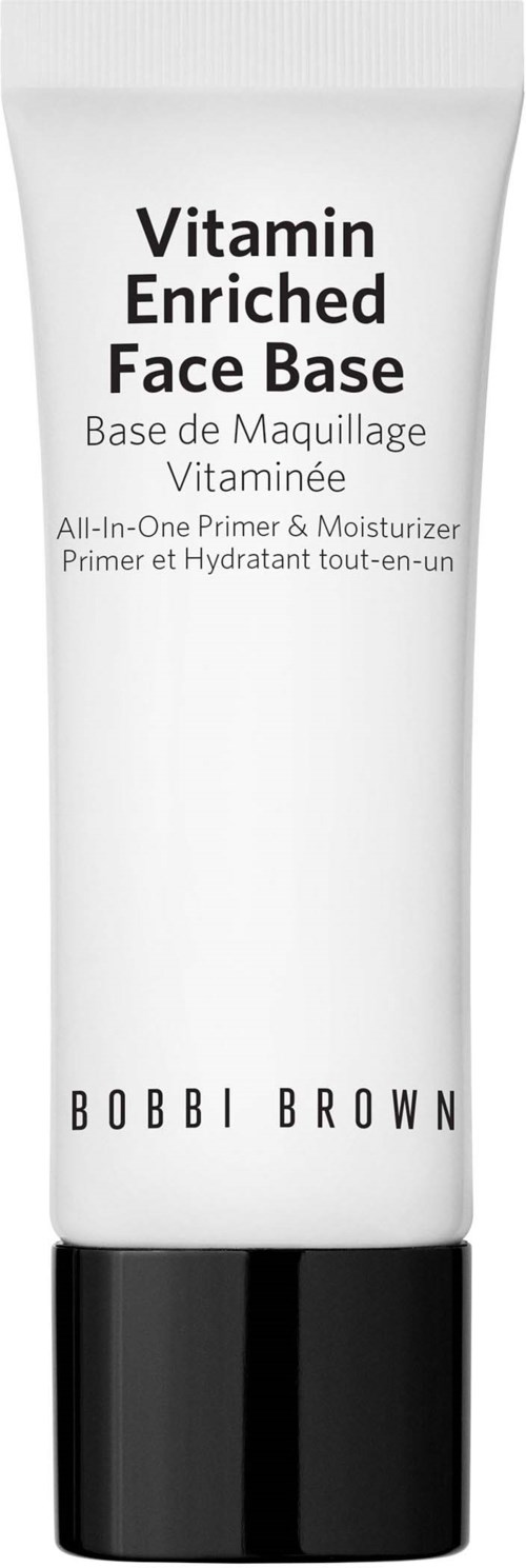 En vit tub med svart lock, märkning 'Vitamin Enriched Face Base' av Bobbi Brown, för hudvård.