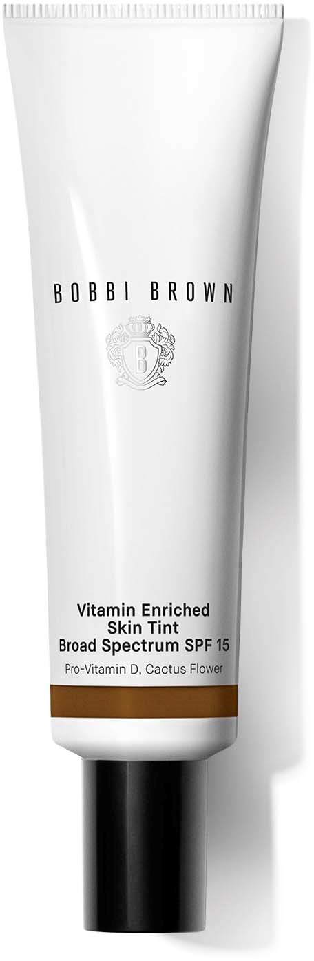 A white tube with a black cap, labeled Robbi Brown, Vitamin Enriched Skin Tint, SPF 15, with a brown stripe.