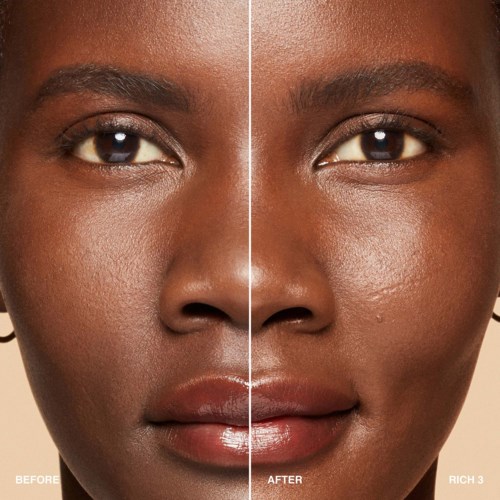 A close-up of a woman's face showing skin before and after skincare, with smoother skin on the right side.