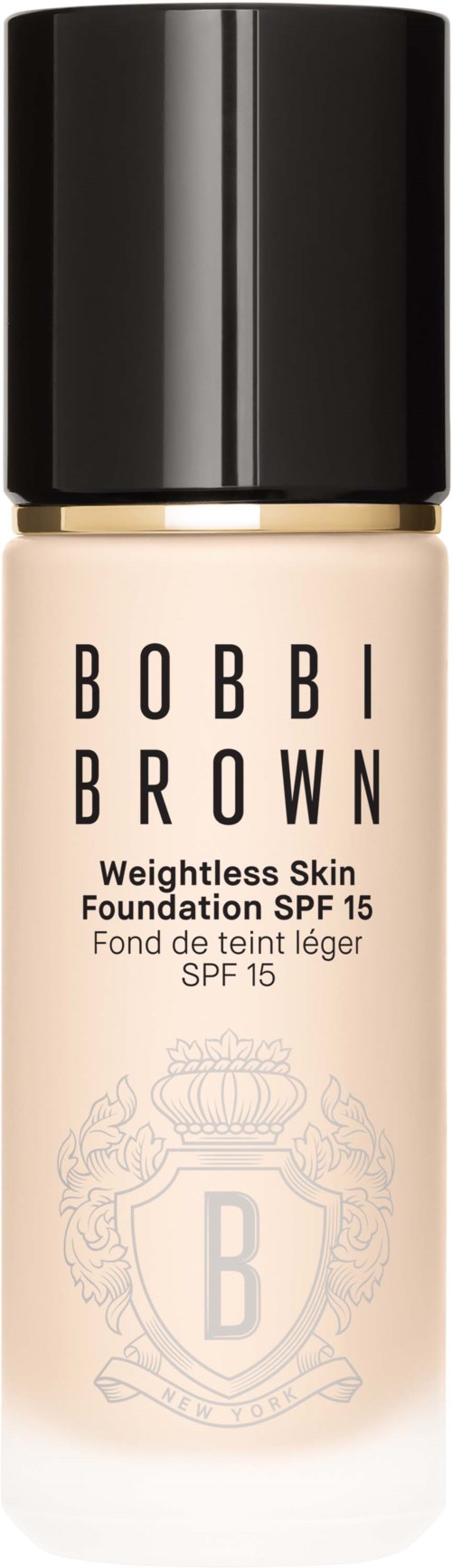 Bobbi Brown foundationflaska med svart lock, ljusbeige färg och en vapensköldslogga.