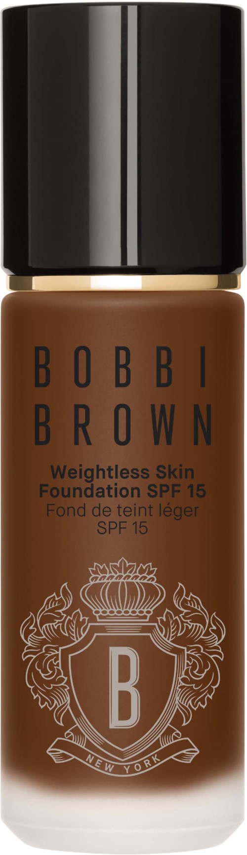 A foundation bottle labeled Bobbi Brown, SPF 15, for light skin, with a black cap and decorative crest emblem.