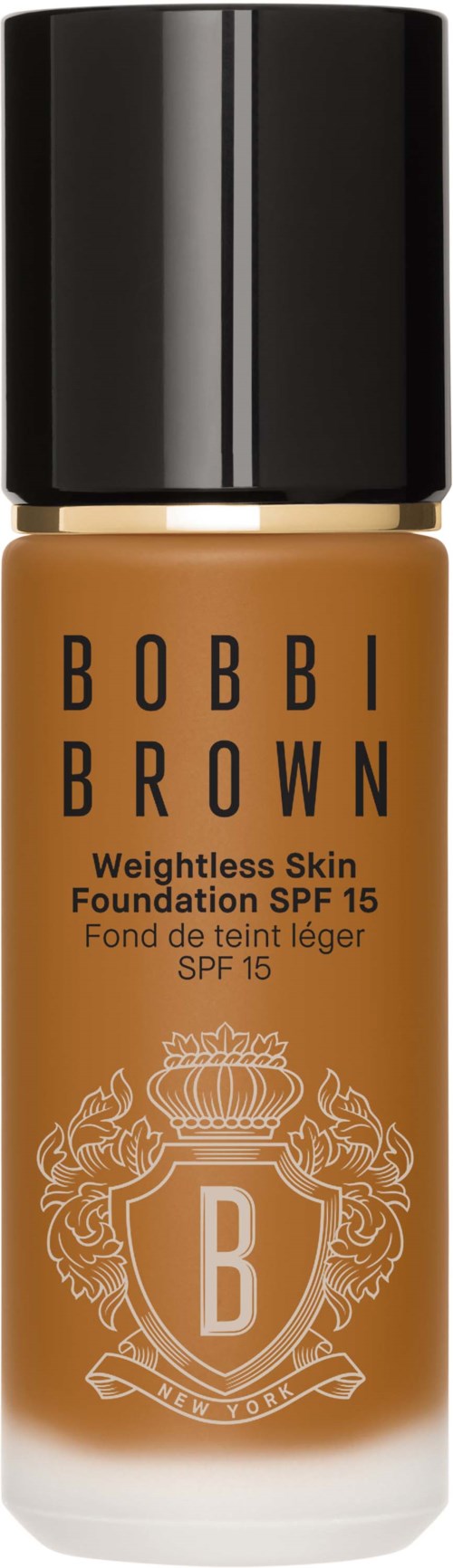 A foundation bottle with a black cap, light brown color, and gold logo and writing.