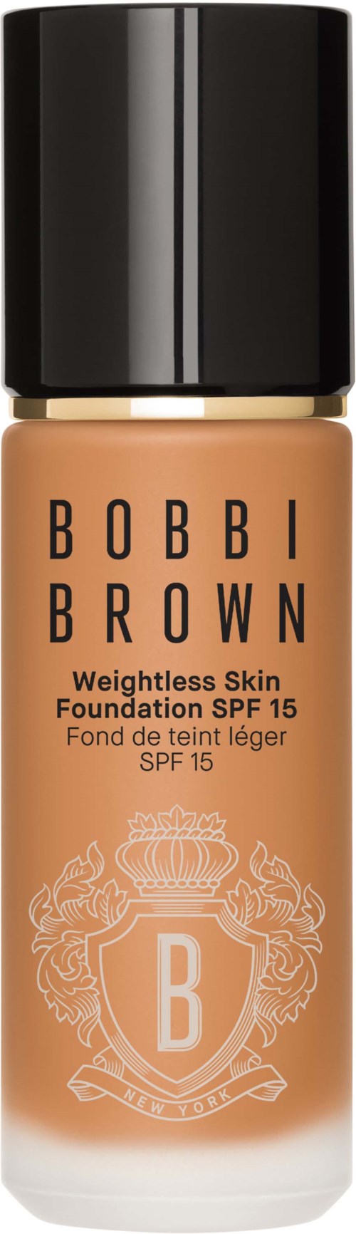 En foundationflaska märkt Bobbi Brown med SPF 15, i beige färg med svart lock.
