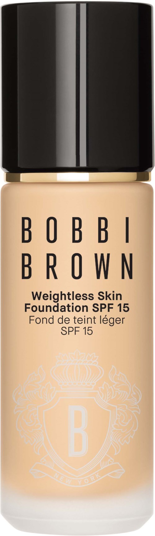 Foundation bottle with black cap, labeled "Bobbi Brown Weightless Skin Foundation SPF 15". Light beige color.
