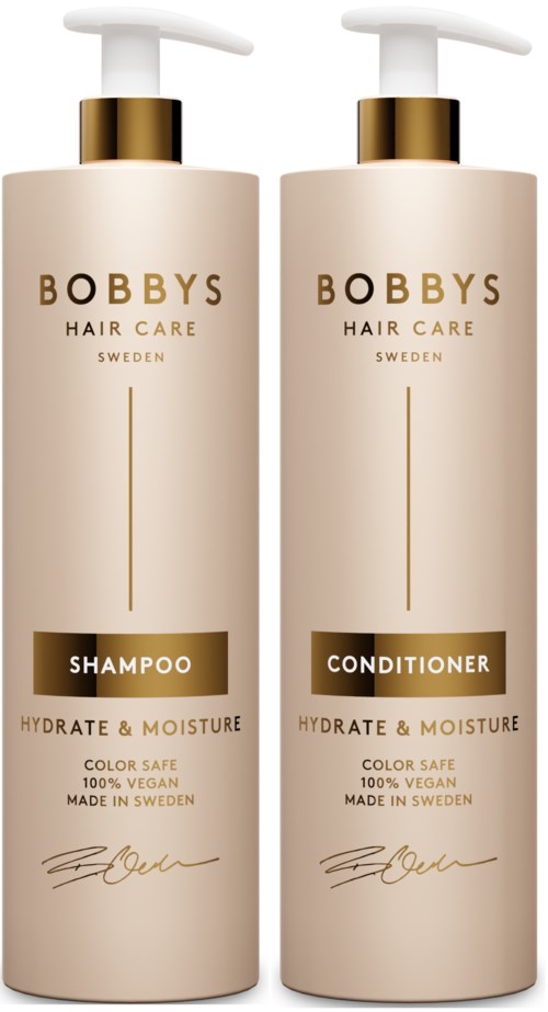 Two bottles of Bobbys Hair Care shampoo and conditioner, labeled for hydration, moisture, and vegan quality.