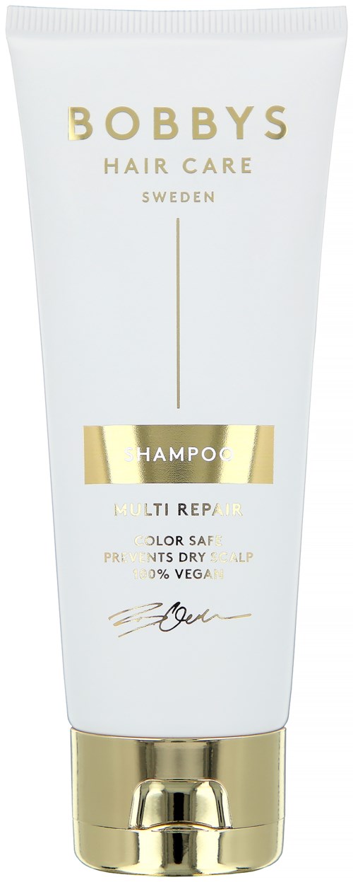 Eine weiße Tube mit Gold- und schwarzen Text, gekennzeichnet als Bobby's Hair Care Shampoo aus Schweden, für Mehrfachreparatur und Farbschutz.