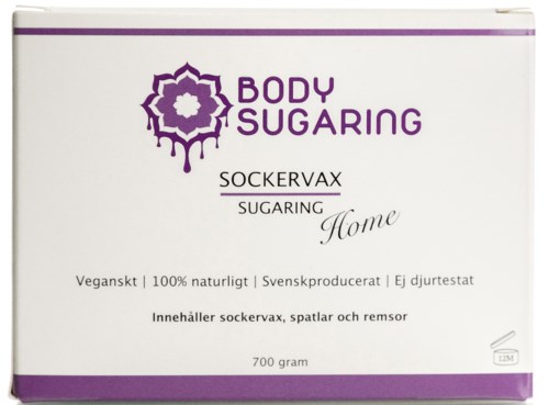 En box med sockervax för hemmabruk, med naturliga ingredienser, tillverkat i Sverige, innehåller mjuk vax, spatlar och remsor.