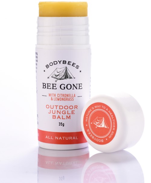 Weiße Außenbalsamstift mit gelbem Oberteil, beschriftet 'BODYBEES BEE GONE,' mit Zitronella und Zitronengras.