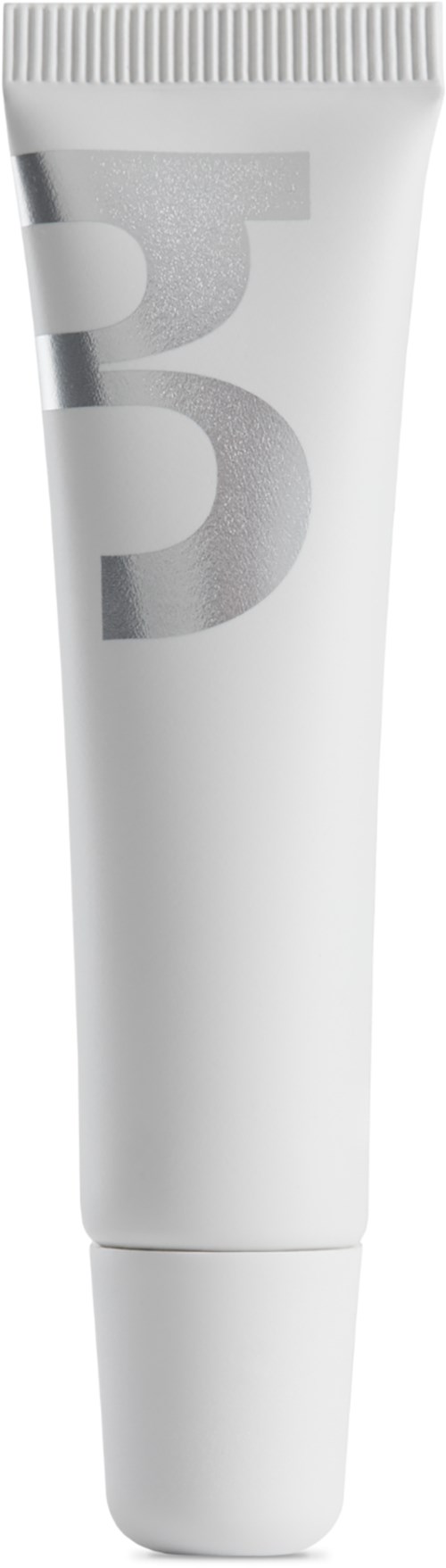 Eine weiße Tube mit einer großen grauen Zahl "3" darauf, wahrscheinlich ein Kosmetik- oder Hautpflegeprodukt.