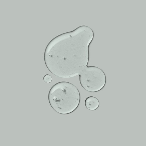 Kleine, klare Wassertröpfchen oder Blasen auf grauem Hintergrund.