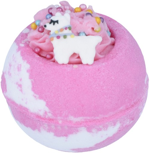 Ein rosa-weißer Badeball mit einer niedlichen weißen Tierfigur, bunten Streuseln und rosa Schaum.