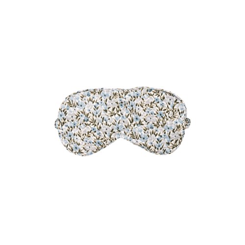 A floral patterned sleep mask with blue, white, and beige colors.