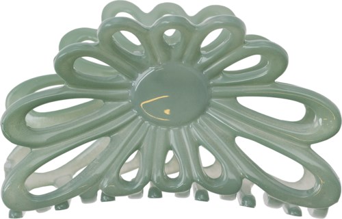 A light green hair clip shaped like a flower with loops and a rounded center.