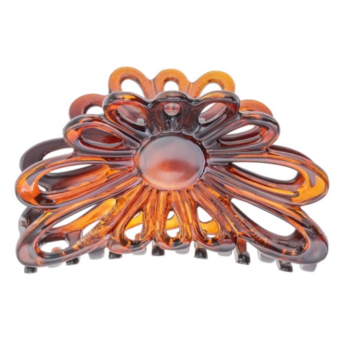 A large orange-brown hair clip shaped like a flower with open petals and a shiny center.
